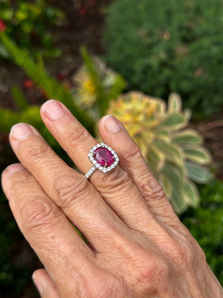 18 karat white gold, 6 carat pink tourmaline and diamond halo ring