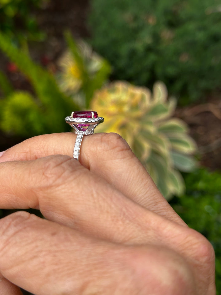 18 karat white gold, 6 carat pink tourmaline and diamond halo ring