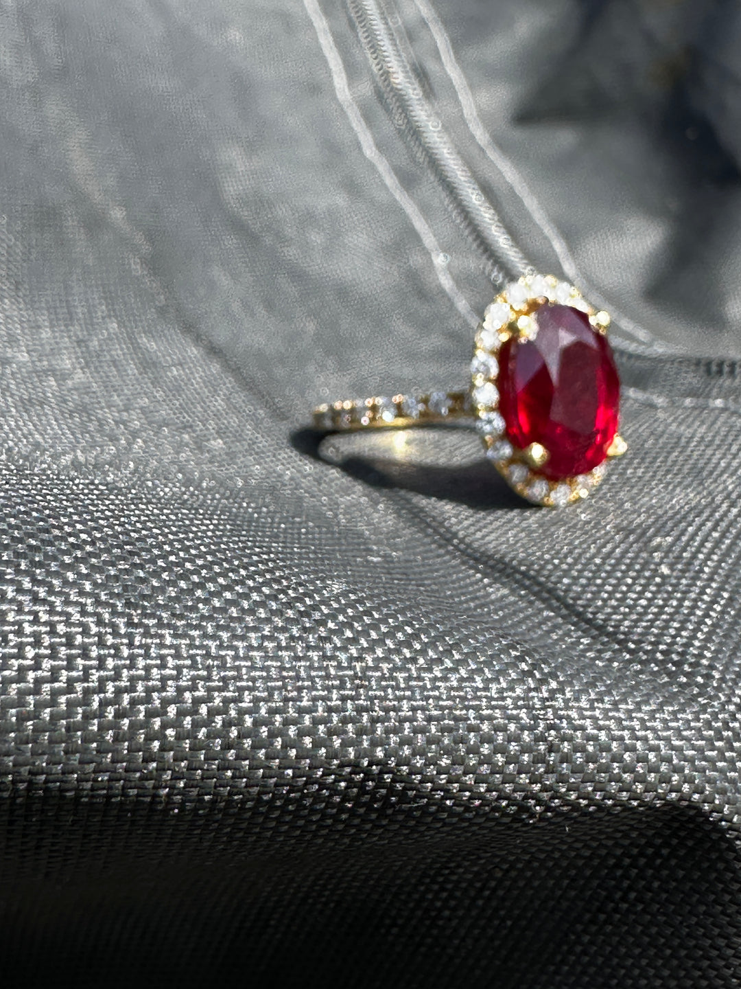 14 karat 3.93 carat red ruby halo ring