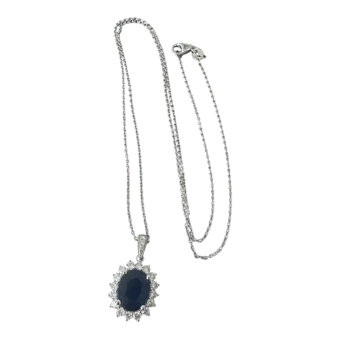 14 karat white gold 2.90 carat sapphire and Diamond Halo, pendant, and chain ￼
