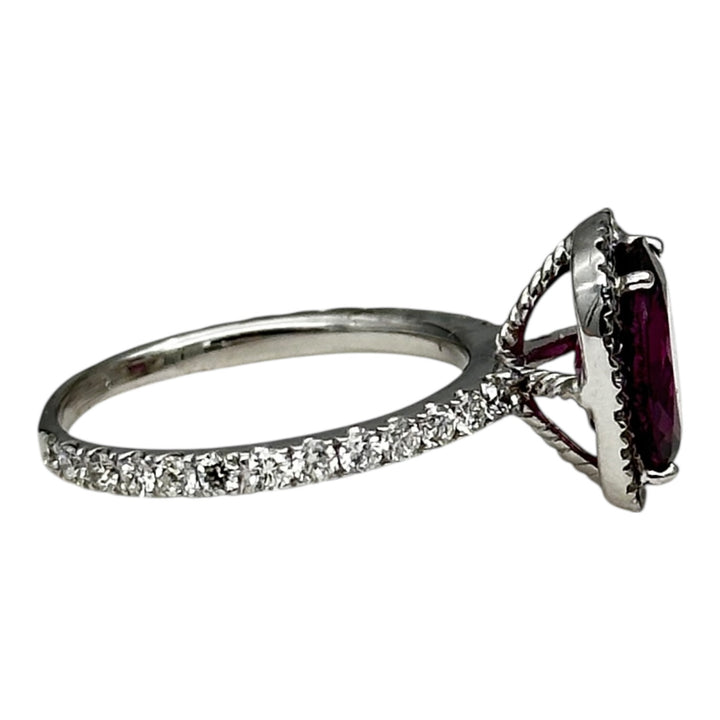 14 karat, 2 carat purple Tourmaline and diamond halo ring