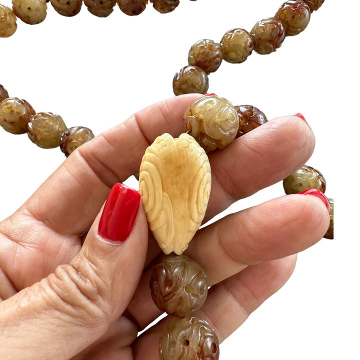 Ivory Colored Chineses Nutsuke Priest Carved on Brownish Jade Beads