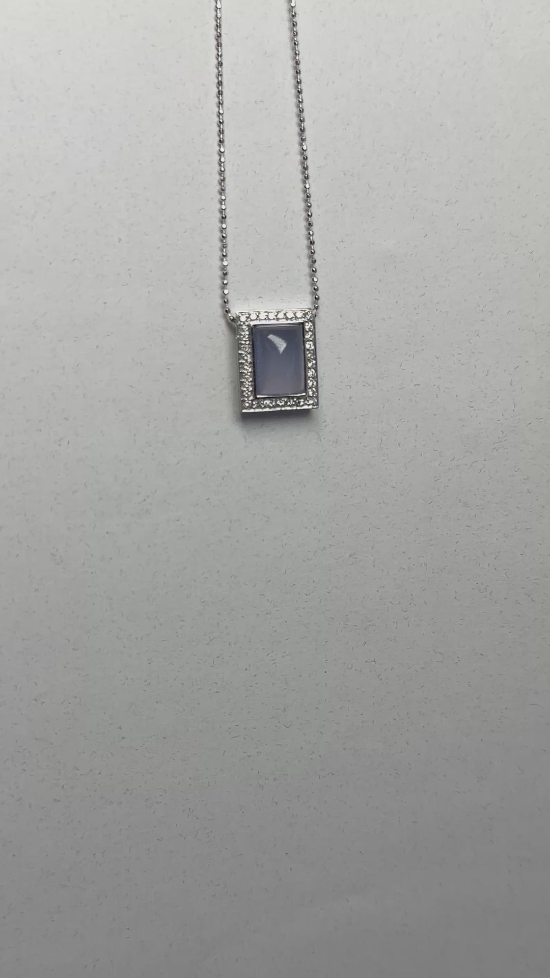 18 karat Chalcedony Gemstone and Diamond Halo Pendant With Chain