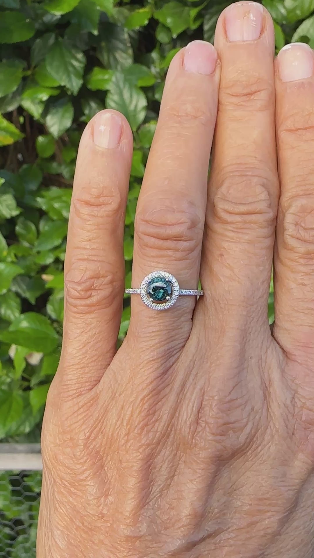 Simon G, 18 Karat Teal Colored Zircon Halo Eternity Band .90ct Ring