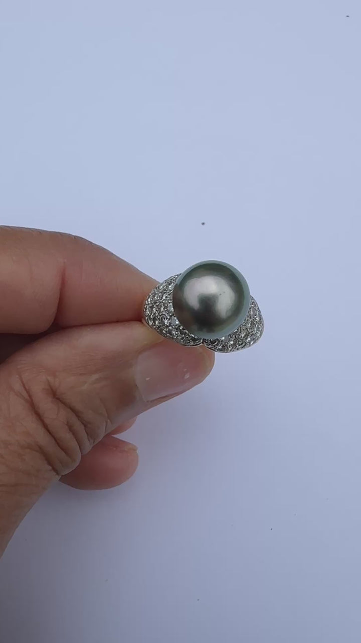 Mid-century, 18 karat Tahitian 12 mm pearl with 1.50 carat diamonds