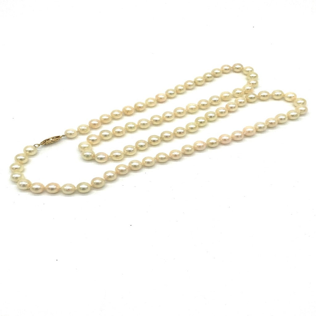 AAA Pearls 24" Strand 14 Kt Gold Clasp