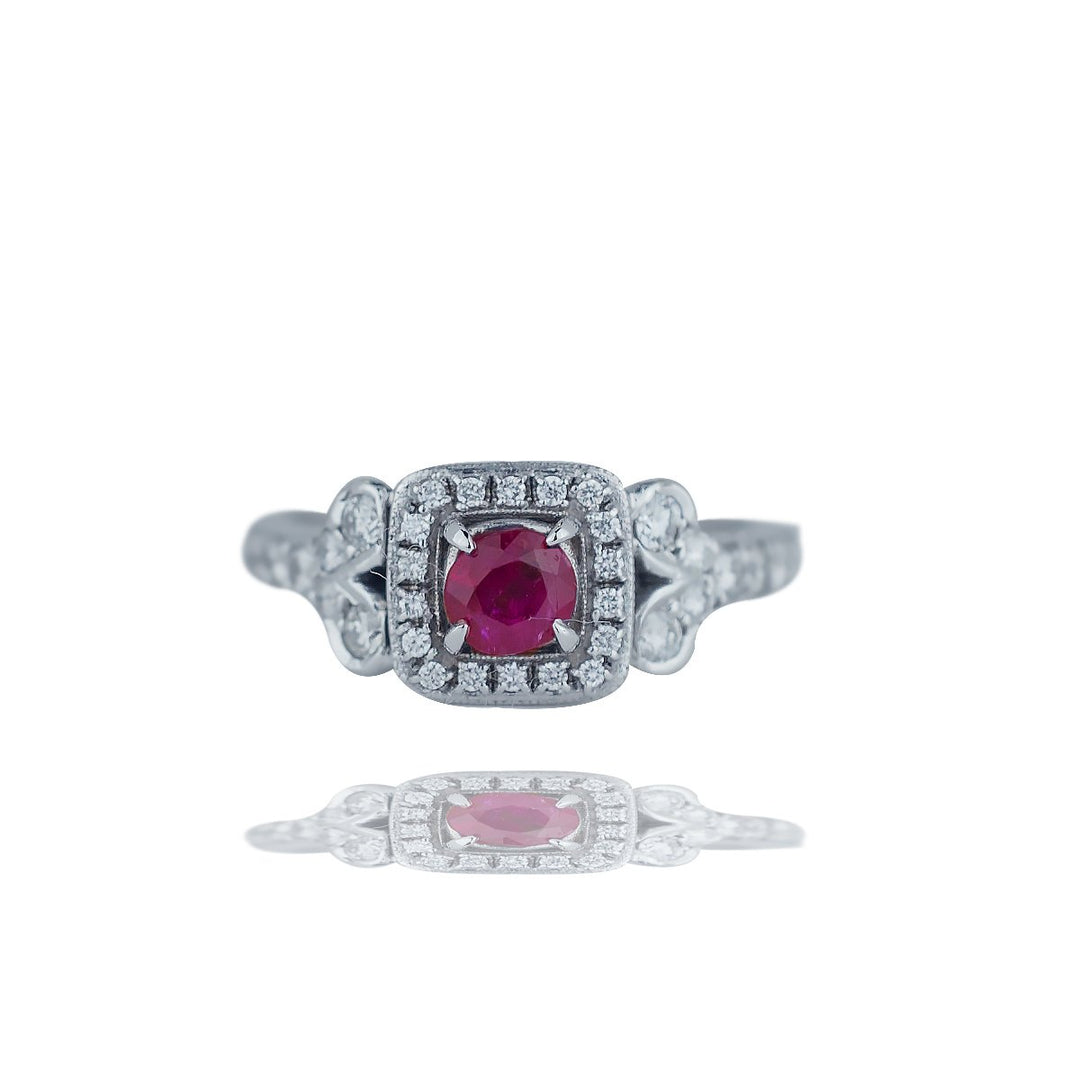 14kt Ruby and Diamond Halo Ring .85tw White gold